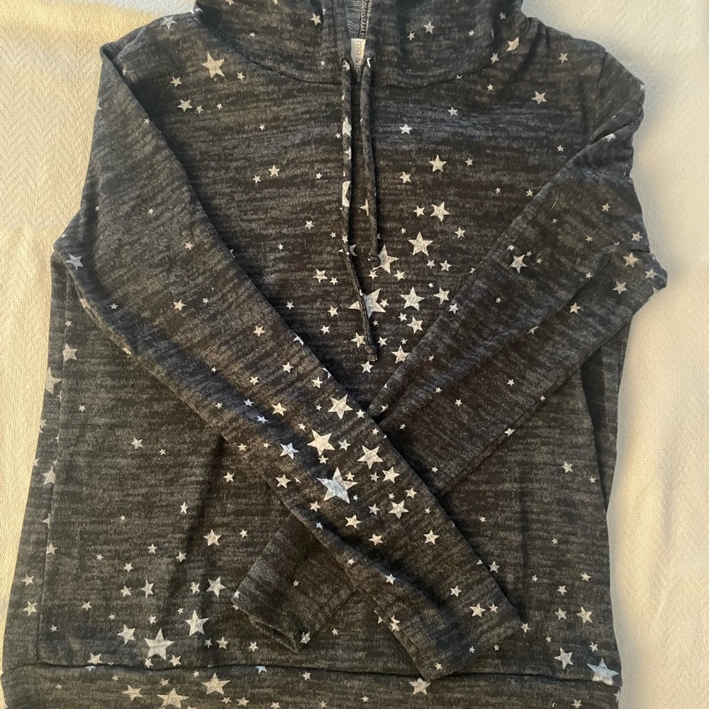 black hoodie with white stars